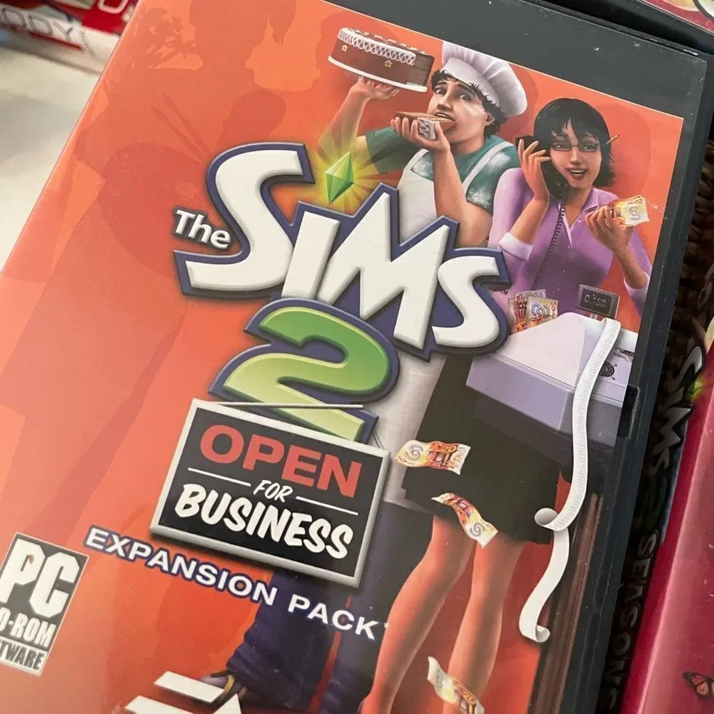 The SIMS PlayStation Vintage Side Video Game Lot PC DVD Pets Family Delux Sets